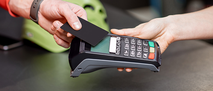 POS machine payment through tap to pay.